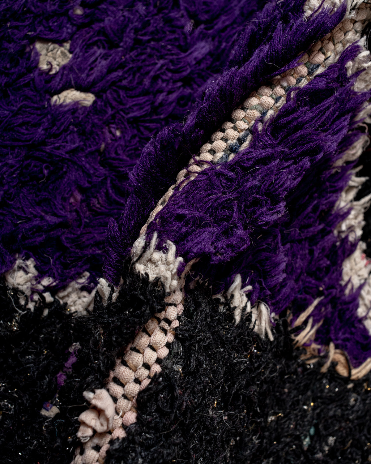Modern designer vintage handcrafted Berber rug from Morocco. Boucherouite runner rug with beautiful colors and patterns.
